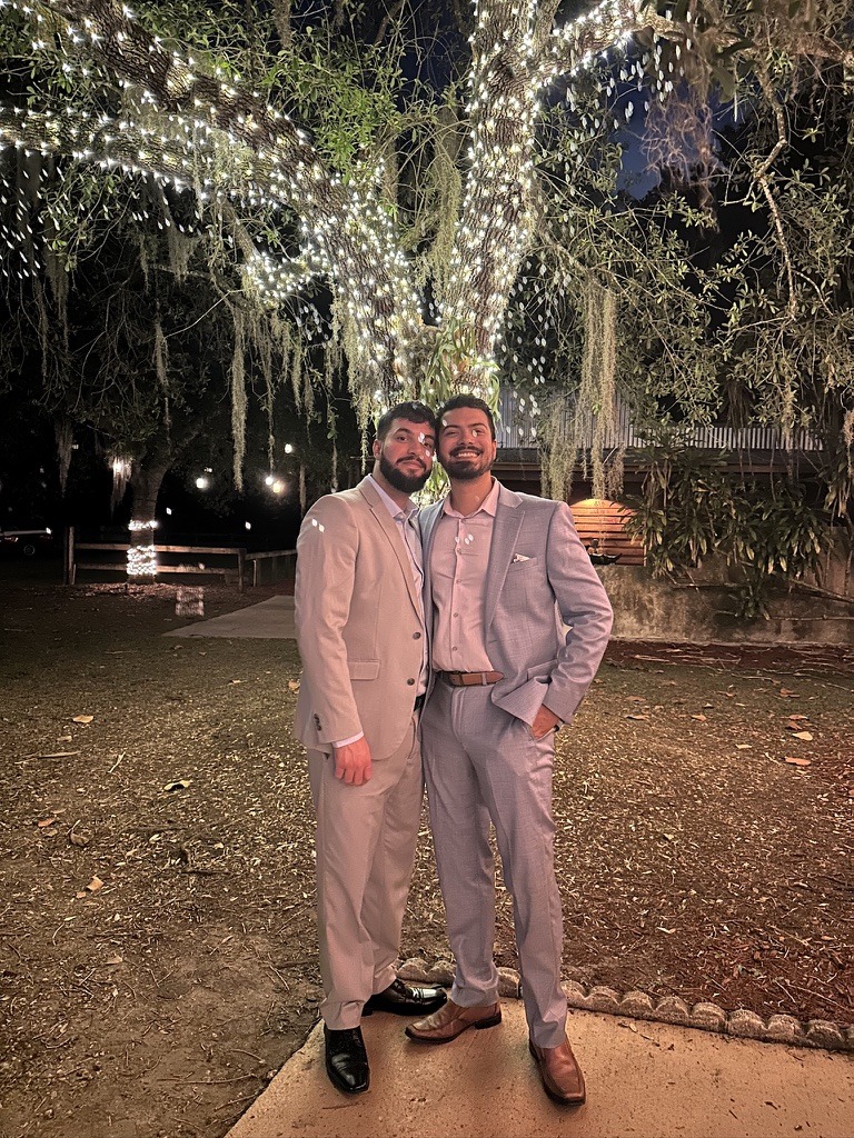 Carlos Silvera with his husband, Aaron Riffa